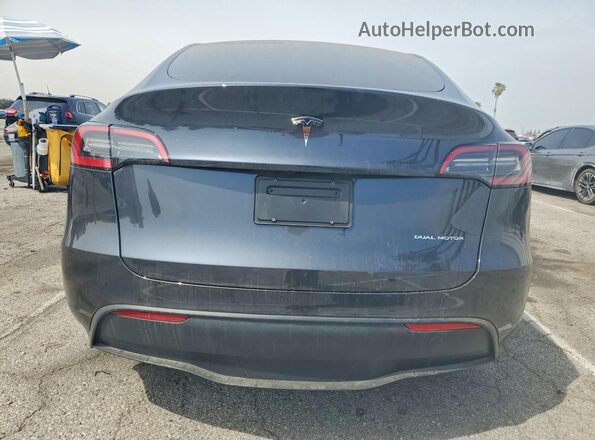 7SAYGDEE7RF001965 2024 TESLA MODEL Black Rear view