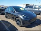2024 Tesla Model Y Long Range Dual Motor All-wheel Drive Gray vin: 7SAYGDEE7RF163837