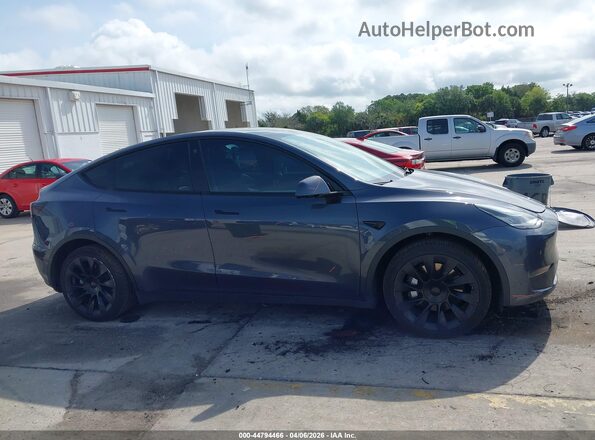 7SAYGDEE8NF387239 2022 TESLA MODEL Y Gray Rear interior view