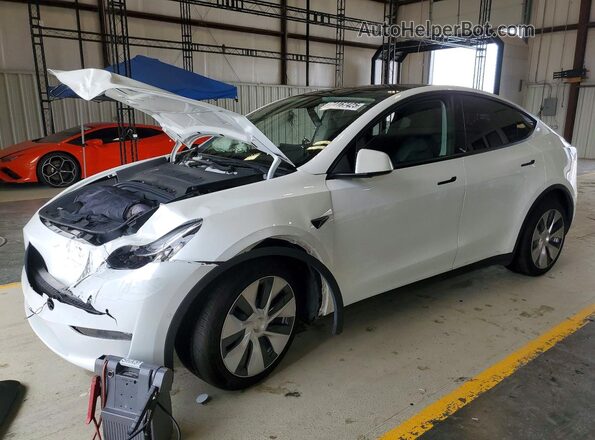 7SAYGDEE8NF504530 2022 TESLA MODEL White წინა მარცხენა ხედი სამი მეოთხედიდან