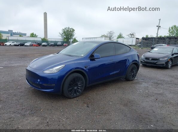 7SAYGDEE8RA280081 2024 TESLA MODEL Y Blue Առջևի ձախ երեք քառորդ տեսարան