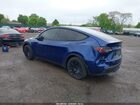 2024 Tesla Model Y Long Range Dual Motor All-wheel Drive Blue vin: 7SAYGDEE8RA280081