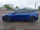 2024 Tesla Model Y Long Range Dual Motor All-wheel Drive Blue vin: 7SAYGDEE8RA280081