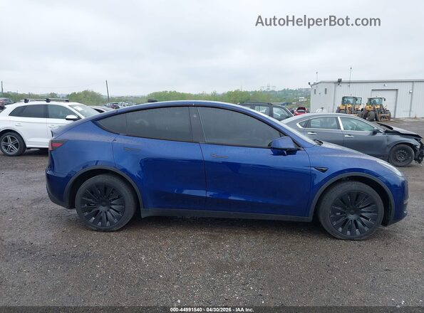 7SAYGDEE8RA280081 2024 TESLA MODEL Y Blue Սալոնի հետևի տեսք