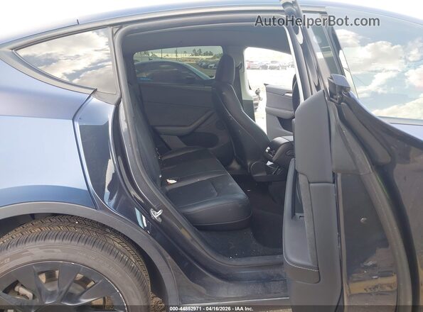 7SAYGDEE8SA359952 2025 TESLA MODEL Y Blue Vista de la etiqueta del VIN