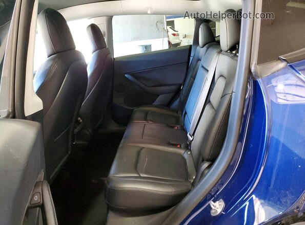 7SAYGDEE9NF382244 2022 TESLA MODEL Blue Սալոնի հետևի տեսք