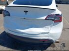 2024 Tesla Model Y Long Range Dual Motor All-wheel Drive White vin: 7SAYGDEE9RF115689