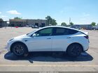 2024 Tesla Model Y Long Range Dual Motor All-wheel Drive White vin: 7SAYGDEE9RF115689