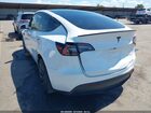 2024 Tesla Model Y Long Range Dual Motor All-wheel Drive White vin: 7SAYGDEE9RF115689