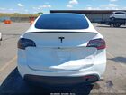 2024 Tesla Model Y Long Range Dual Motor All-wheel Drive White vin: 7SAYGDEE9RF115689