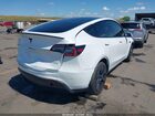 2024 Tesla Model Y Long Range Dual Motor All-wheel Drive White vin: 7SAYGDEE9RF115689