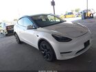2024 Tesla Model Y Long Range Dual Motor All-wheel Drive White vin: 7SAYGDEE9RF206221