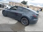 2025 Tesla Model Y Long Range Dual Motor All-wheel Drive Gray vin: 7SAYGDEE9SF295469