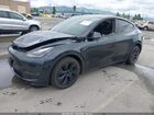 2025 Tesla Model Y Long Range Dual Motor All-wheel Drive Gray vin: 7SAYGDEE9SF295469