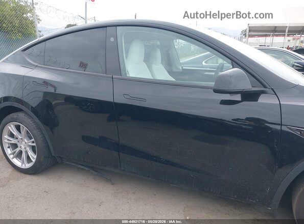 7SAYGDEEXRA236129 2024 TESLA MODEL Y Черный Вид задней части салона