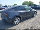 2024 Tesla Model Y Long Range Dual Motor All-wheel Drive Gray vin: 7SAYGDEEXRA262679