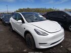 2024 Tesla Model Y Long Range Dual Motor All-wheel Drive White vin: 7SAYGDEEXRF200198