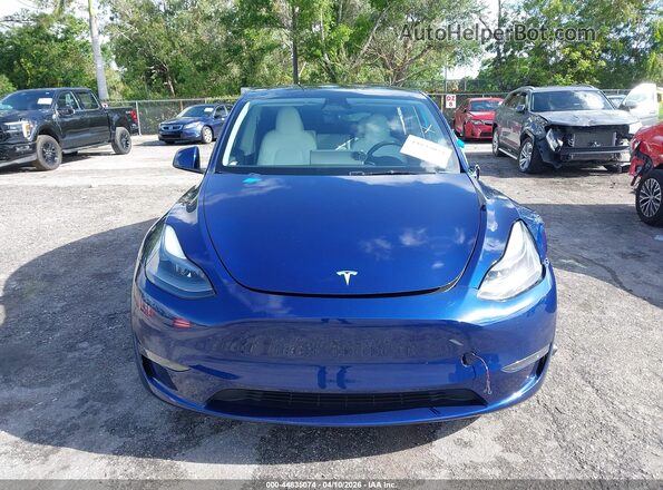 7SAYGDEF1RA285373 2024 TESLA MODEL Y Blue Widok deski rozdzielczej