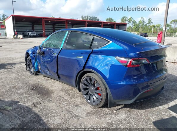 7SAYGDEF1RA285373 2024 TESLA MODEL Y Blue Tył lewy