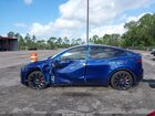 2024 Tesla Model Y Performance Dual Motor All-wheel Drive Blue vin: 7SAYGDEF1RA285373