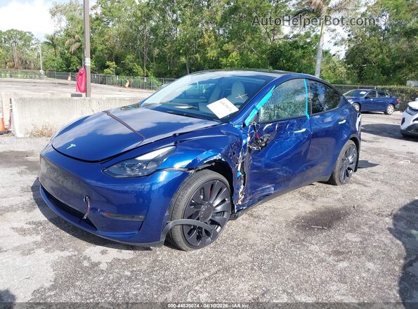7SAYGDEF1RA285373 2024 TESLA MODEL Y Blue Przód lewy