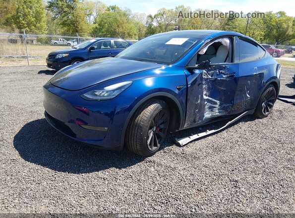 7SAYGDEF2NF491069 2022 TESLA MODEL Y Blue Vista tres cuartos delantera izquierda
