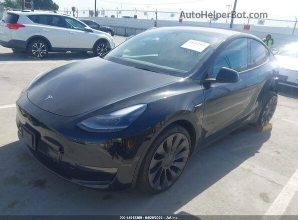 7SAYGDEF2NF491203 2022 TESLA MODEL Y Black წინა მარცხენა ხედი სამი მეოთხედიდან
