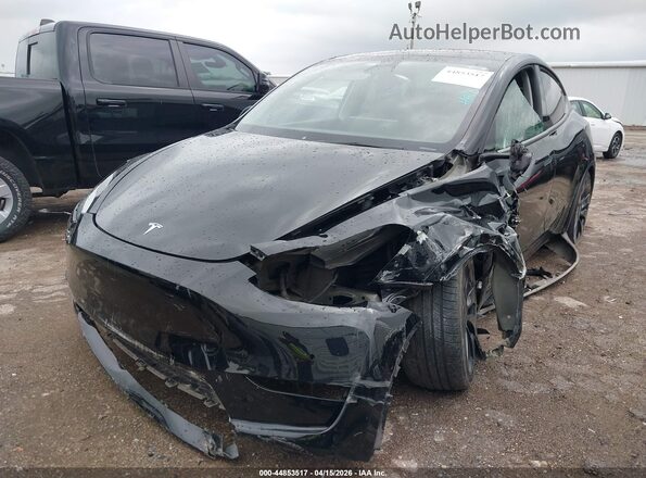 7SAYGDEF2NF564571 2022 TESLA MODEL Y Black წინა მარცხენა ხედი სამი მეოთხედიდან