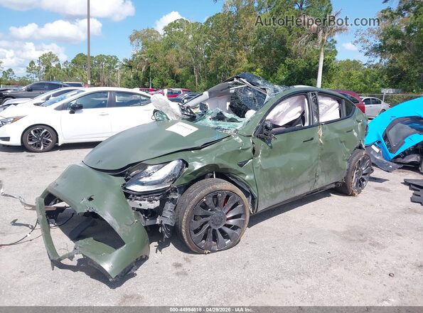 7SAYGDEF3RA311889 2024 TESLA MODEL Y Green Przód lewy