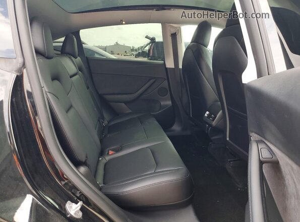7SAYGDEF4NF454587 2022 TESLA MODEL Black Vista interior trasera