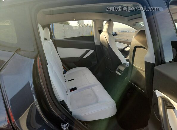 7SAYGDEF5NF326200 2022 TESLA MODEL Gray Rear interior view