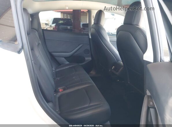 7SAYGDEF5NF554715 2022 TESLA MODEL Y White VIN კოდის სტიკერის ხედი