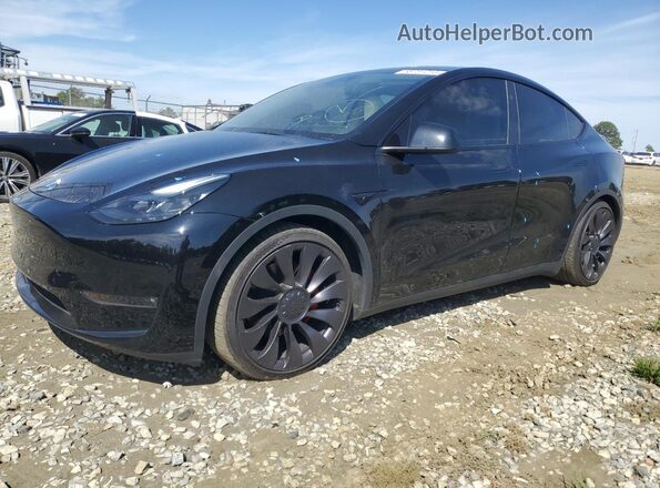 7SAYGDEF6PF863550 2023 TESLA MODEL Black წინა მარცხენა ხედი სამი მეოთხედიდან