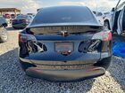 2024 Tesla Model Y Black vin: 7SAYGDEF6RF048557