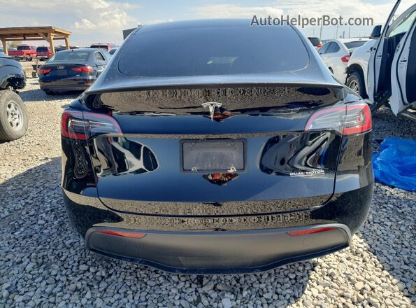 7SAYGDEF6RF048557 2024 TESLA MODEL Black Widok z tyłu