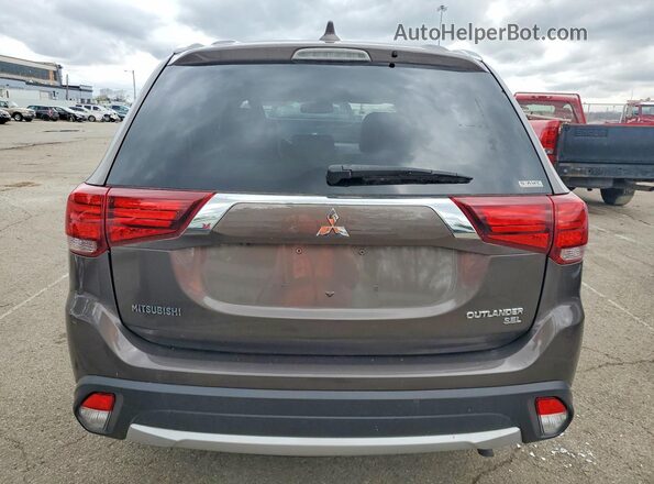 JA4AZ3A30HZ049351 2017 MITSUBISHI OUTLANDER Коричневый Вид салона спереди