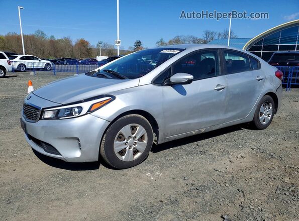 3KPFK4A74JE219463 2018 KIA FORTE Серебряный Передняя левая четверть