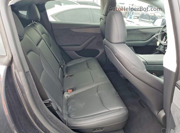 7SAYGDED1TF537387 2026 TESLA MODEL Y Gray ძრავის განყოფილების ხედი