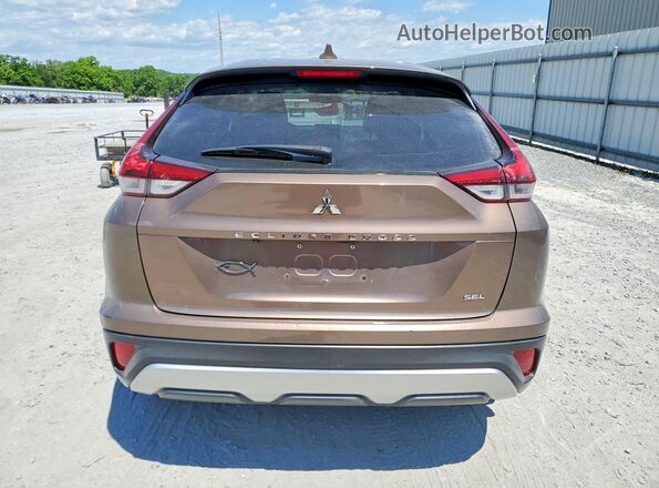 JA4ASWAA9NZ057030 2022 MITSUBISHI ECLIPSE Коричневый Вид салона спереди