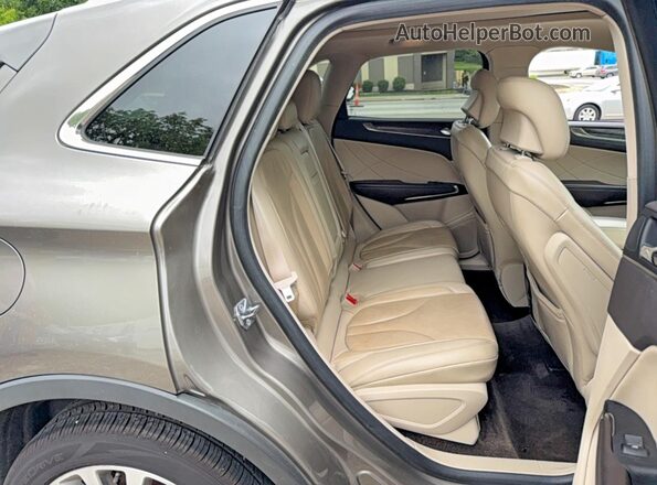 5LMCJ3D90HUL69989 2017 LINCOLN MKC Brown Вид салону спереду