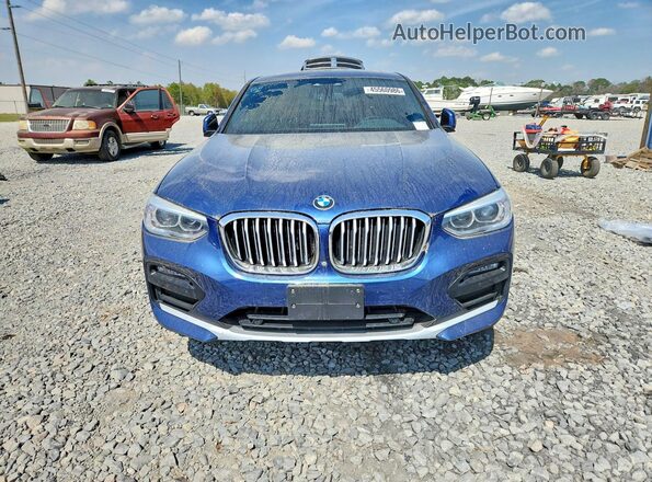 5UX2V1C02L9B53802 2020 BMW X4 Blue Widok z tyłu