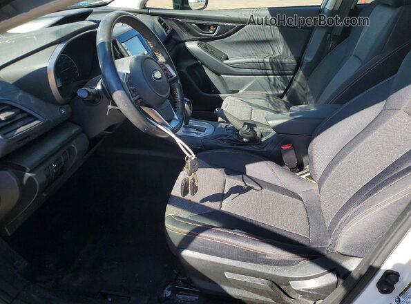 JF2GTABCXJH219829 2018 SUBARU CROSSTREK Белый Вид салона спереди