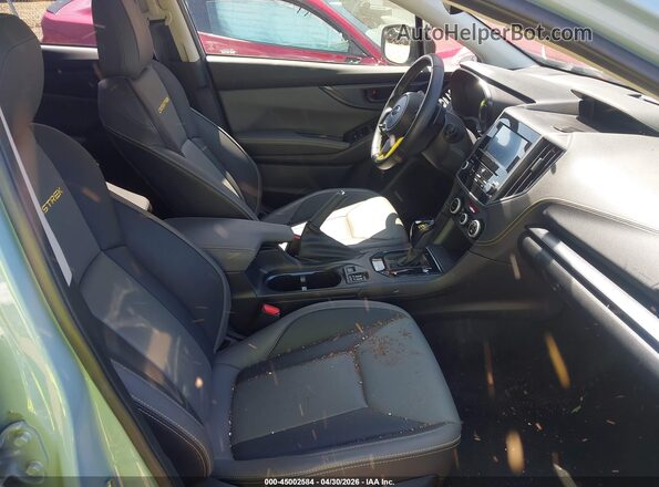 JF2GTHRC4MH315250 2021 SUBARU CROSSTREK Light Blue Front interior view