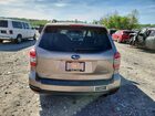 2016 Subaru Forester 2.5i Touring Tan vin: JF2SJAXC9GH536941