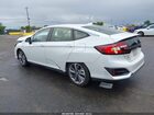 2018 Honda Clarity Plug-in Hybrid Touring Белый vin: JHMZC5F37JC011069