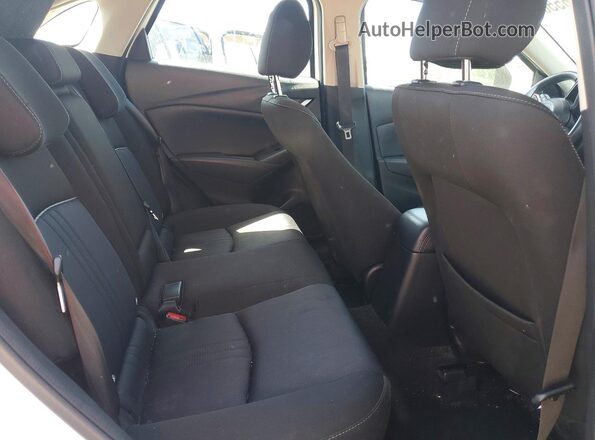 JM1DKDB76M1510883 2021 MAZDA CX-3 White Rear interior view