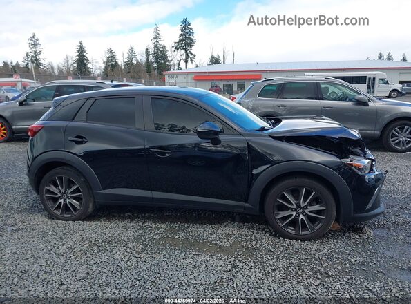 JM1DKFC77H0161111 2017 MAZDA CX-3 Черный Вид задней части салона