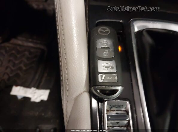JM1GJ1W53G1412910 2016 MAZDA 6 Бежевый Вид панели приборов