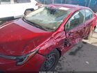 2023 Toyota Corolla Le Red vin: JTDB4MEE6PJ009945