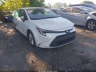 2024 Toyota Corolla Hybrid Le White vin: JTDBDMHE2RJ005793